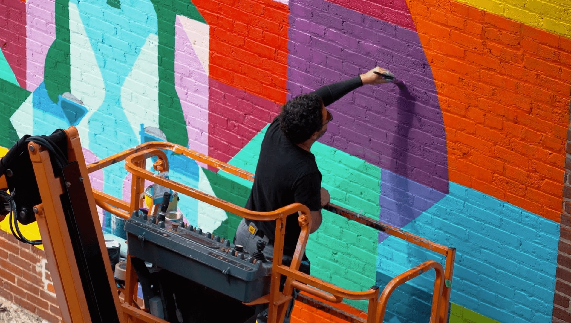 Guy panting mural